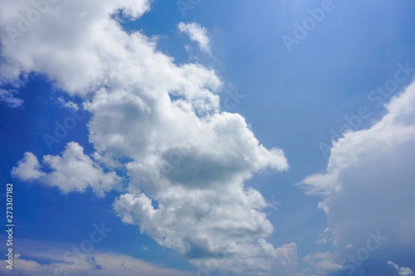 Fototapeta Blue sky with white clouds background.