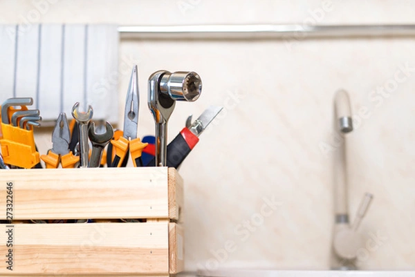 Fototapeta construction tools in wooden box in kitchen