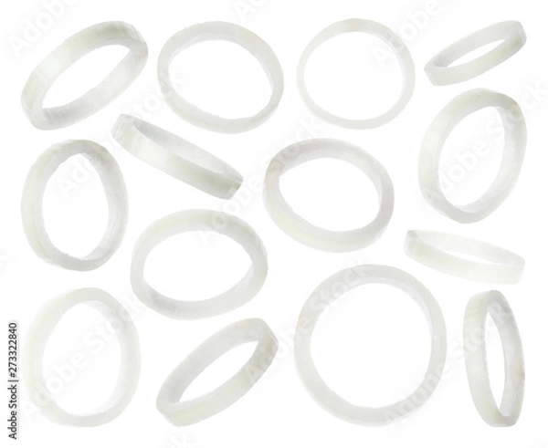 Fototapeta Set of flying cut fresh onion on white background