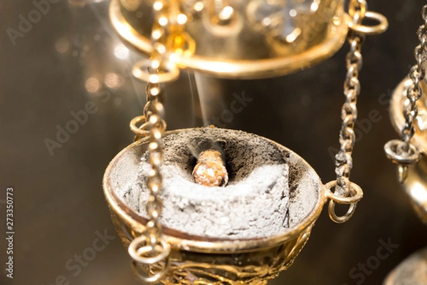 Fototapeta Chain censer with incense on burning charcoal