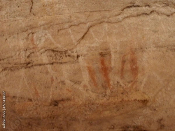 Fototapeta Rock painting on rocks in a desert cave, bushman painting on rock