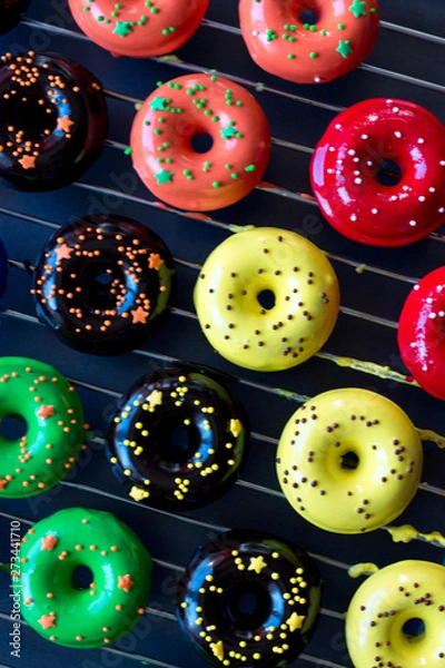 Fototapeta donuts in a glaze mix on  the deco and the trellis