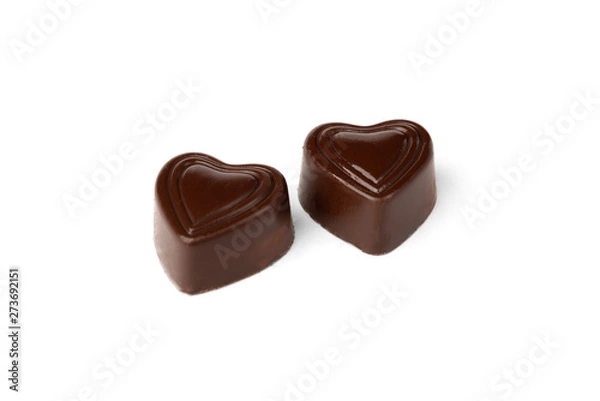 Fototapeta Chocolate sweets in heart shape isolated on white background.
