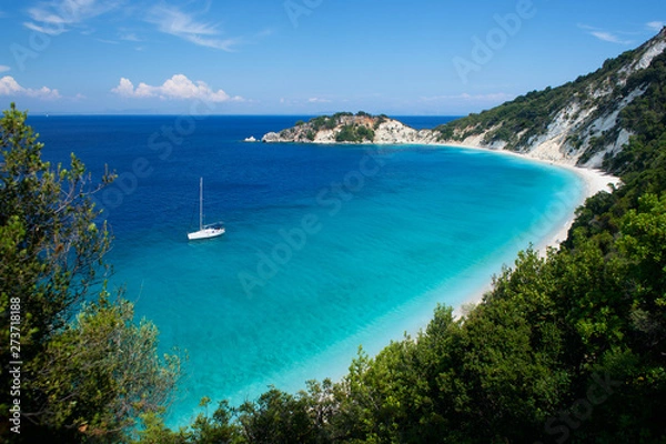 Fototapeta Sailboat on the beach Light blue water on Gidaki on the Ithaca (Ithaki or Ithaka) island like paradise with blue sky in Greece Europe