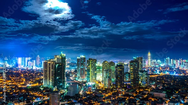 Obraz Rising Moon over the skyline of Metro Manila