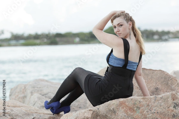 Fototapeta Woman on the rocks