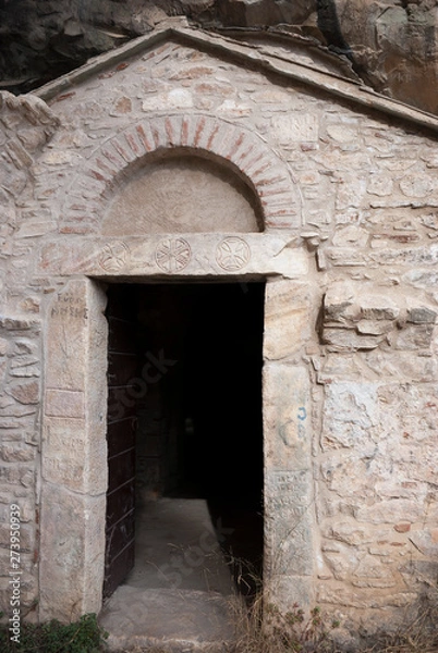 Fototapeta Parnitha Mountain, Athens / Greece, June 2019: The Ntavelis cave and the enclosed monastery