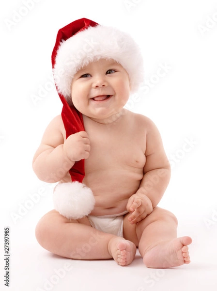 Fototapeta Little child wearing red Christmas cap