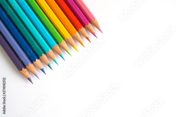 Fototapeta Photo of many color pencils on white background. Various colors. Advertising, blog post, newsletters.