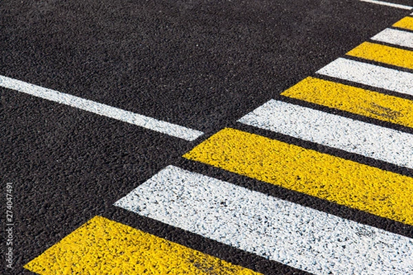 Obraz bright markings of a pedestrian crossing on asphalt, background, texture