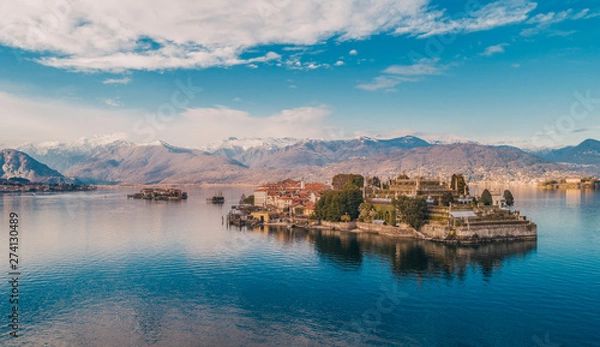 Fototapeta Aerial shot of the Borromean islands in a winter day with reflections in the water