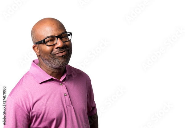 Obraz Portrait of a Cheerful smiling and smirking African American with purple shirt and black glasses on  white isolated background