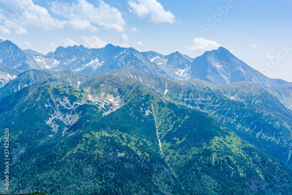 Fototapeta A beautiful picture of the Tatra peaks seen on a beautiful sunny day.