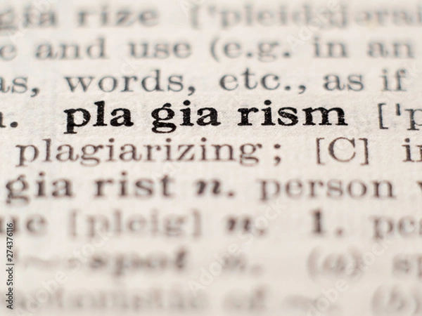 Obraz Dictionary definition of word plagiarism, selective focus.
