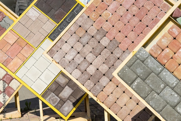 Obraz Sale of tiles for the sidewalk and tracks.