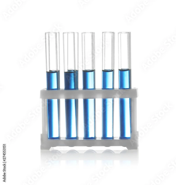Fototapeta Test tubes with liquid samples in rack on white background. Chemistry glassware
