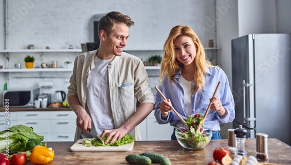 Obraz Young couple in the kitchen