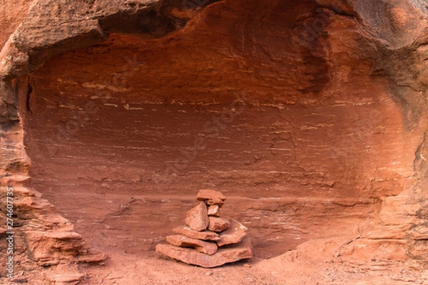 Obraz A small rock cairn in a niche.  Sedona, AZ, USA.