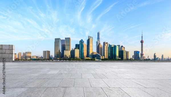 Fototapeta Shanghai skyline and modern city skyscrapers with empty floor at sunset,China