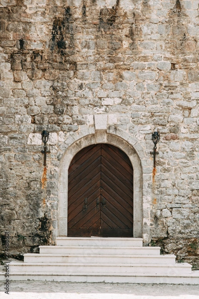 Fototapeta Stone in Montenegro and Europe. The texture of the stonework and old buildings.