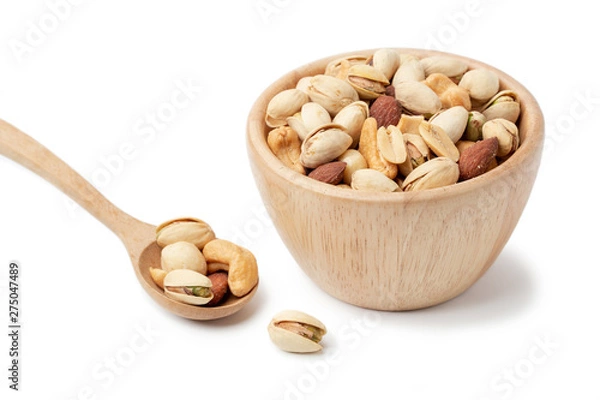 Fototapeta mixed nuts in white wooden bowl isolated on white background.