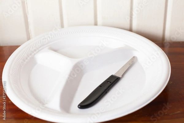 Fototapeta Empty Plate With Knife