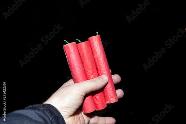 Obraz Silvesterknaller in Hand halten