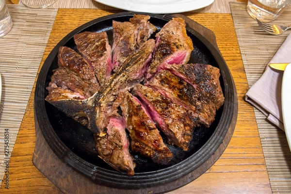 Obraz Florentine steak in a restaurant in Florence