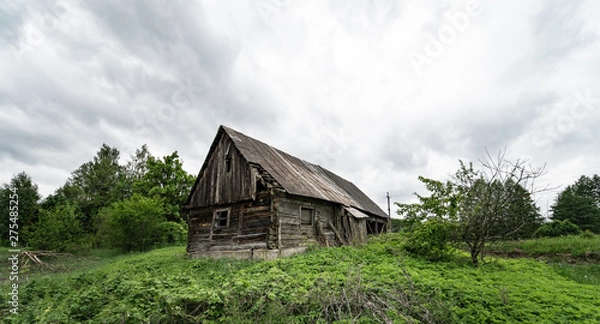 Fototapeta Abandoned farm in the filed