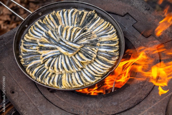Obraz Frieding fish on stove