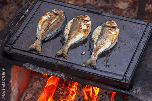 Obraz Sea bream fish on barbeque