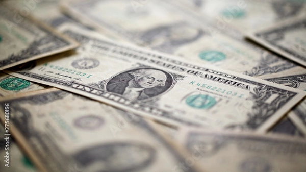 Fototapeta U.S. dollar, American dollar bank notes for business, finance concept background, selective focus with shallow depth of field, hd ratio, 16x9