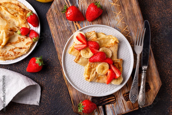 Fototapeta Crepes with strawberry and banana