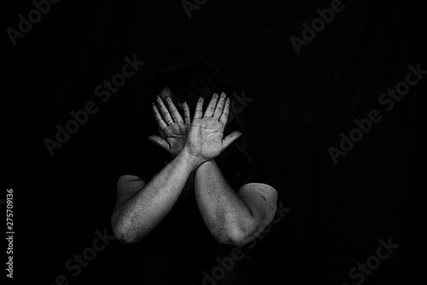 Obraz Victim with hands, victim of emotional stress and pain, abducted, abused, hostage, scared, restricted, trapped, may suffer, Stop violence and trafficking in women.