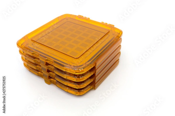Fototapeta Photo of photomasks for photolithography process an orange boxes