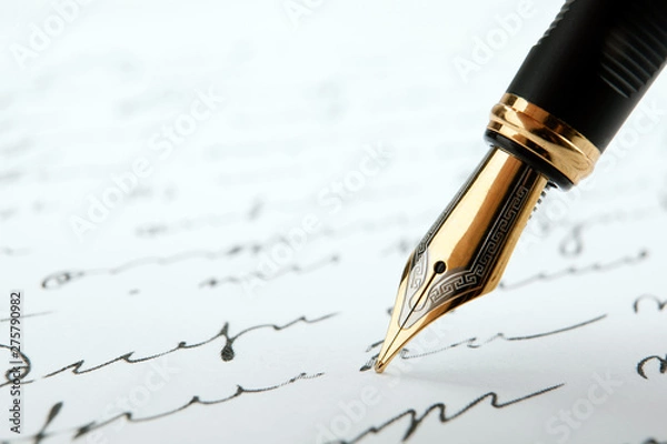 Obraz fountain pen on paper with ink text on a white background