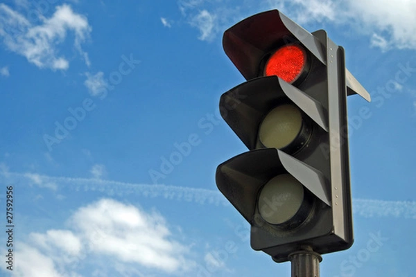 Fototapeta Red color on the traffic light
