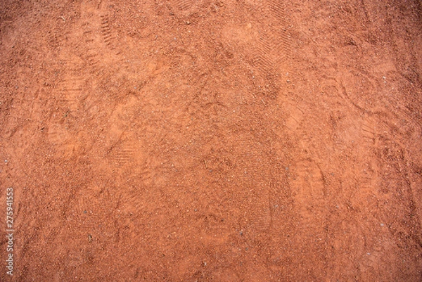 Obraz Red sand texture with shoe prints on top