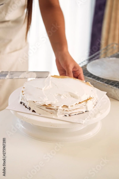 Obraz Womon are making in the kitchen.