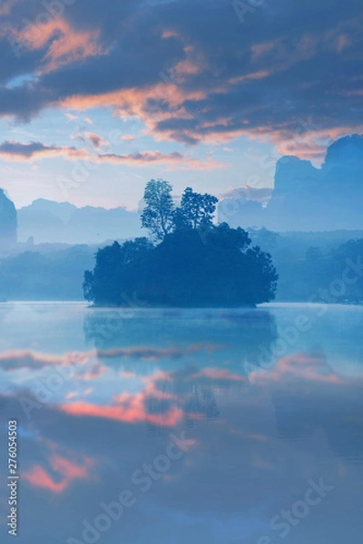 Fototapeta Vertical image of Lake view a Baan Nong Thale in Krabi, Thailand during sunrise with beautiful cloud.