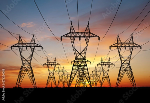 Obraz Electricity power pylons over sunset
