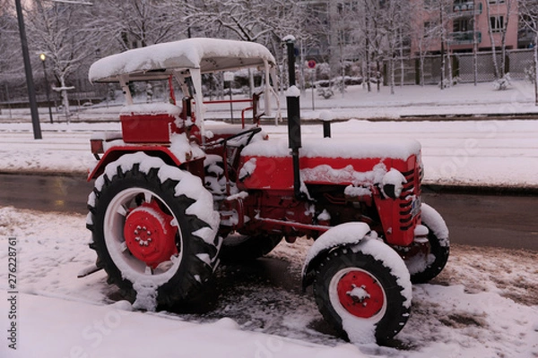 Obraz old tractor coverd in snow