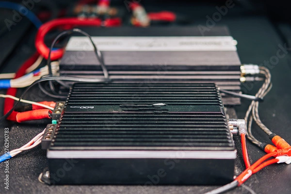 Fototapeta installation of the amplifier and speaker system in the car