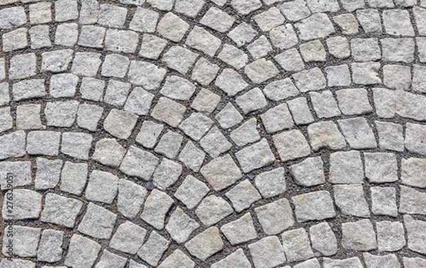 Obraz Old road paved with granite stones.