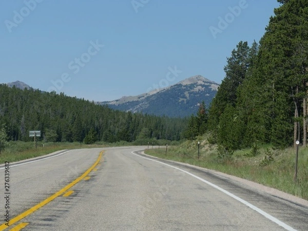 Fototapeta Wide scenic view of nature along Highway 16 through Bighorn National Forest mountain ranges in Wyoming.
