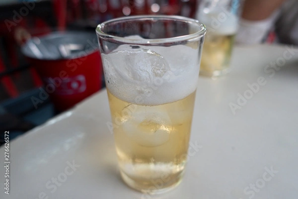Fototapeta Beer in the glass on table