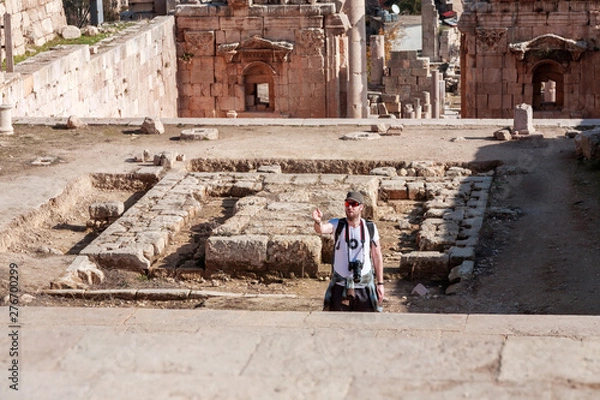 Fototapeta A man with a camera
