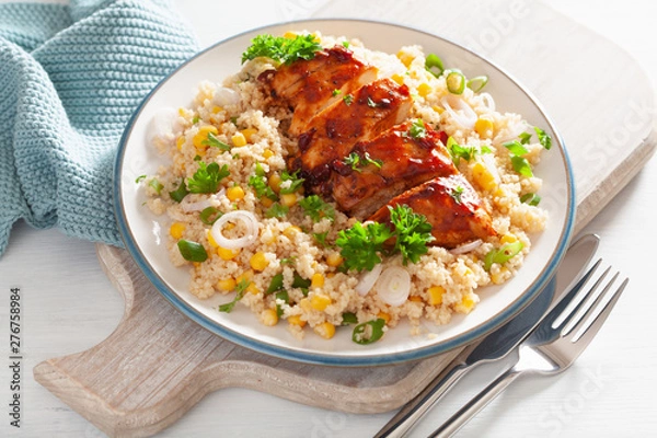 Fototapeta roasted bbq chicken with couscous sweetcorn onion, healthy lunch