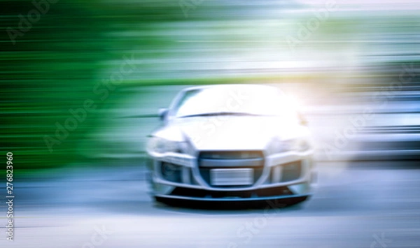 Fototapeta Blurred images of race cars in the Drift race. Colorful backgrounds and fast movements.