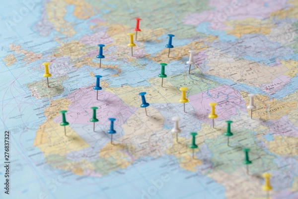 Fototapeta Push pins on the world map